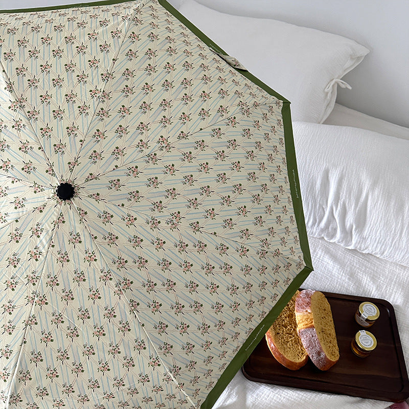 Dame elegant felle paraply med blomsterdesign Skanto