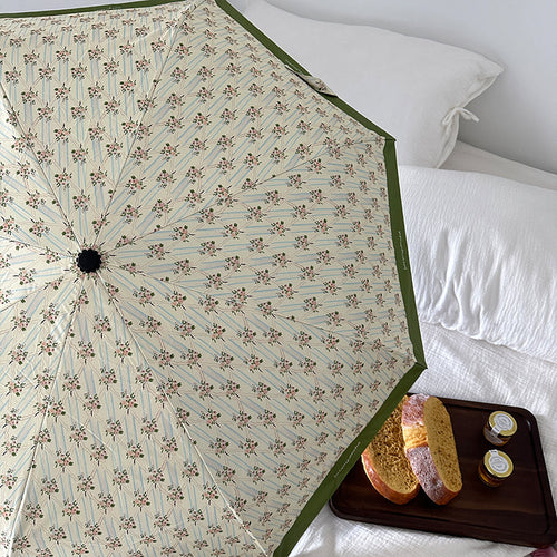Dame elegant felle paraply med blomsterdesign Skanto