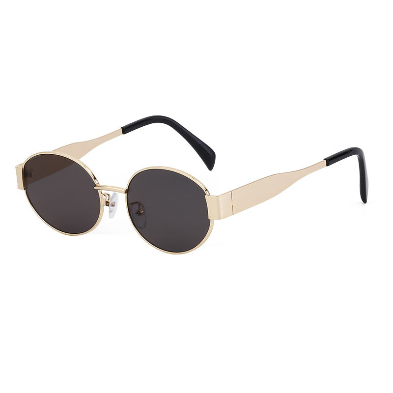 Dame moteriktig solbrille i elegant oval design Skanto