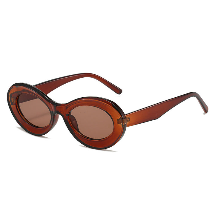 Dame moteriktig solbrille i oval design Skanto