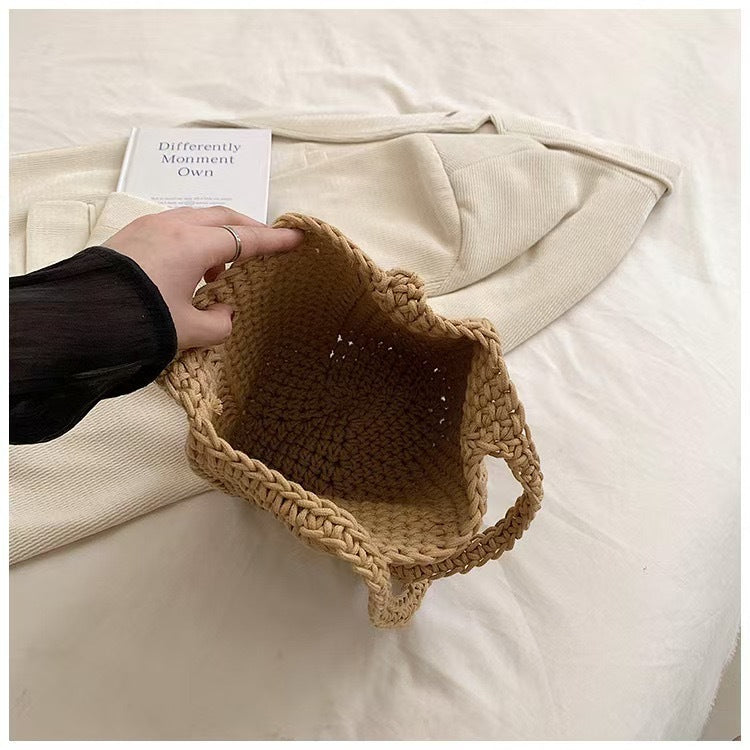 Håndlaget bæreveske i organisk materiale Skanto