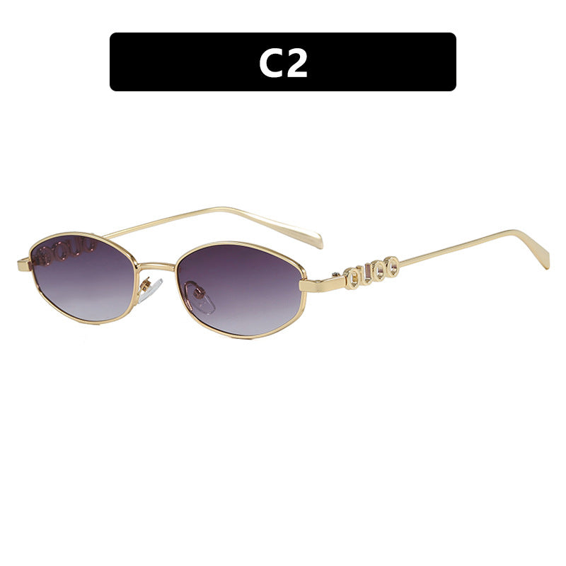 Dame moterik solbrille med elegant rustfritt stålramme og UV-beskyttelse Skanto