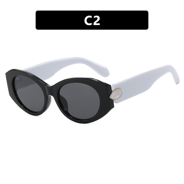 Dame elegant solbrille med stilige konturer Skanto
