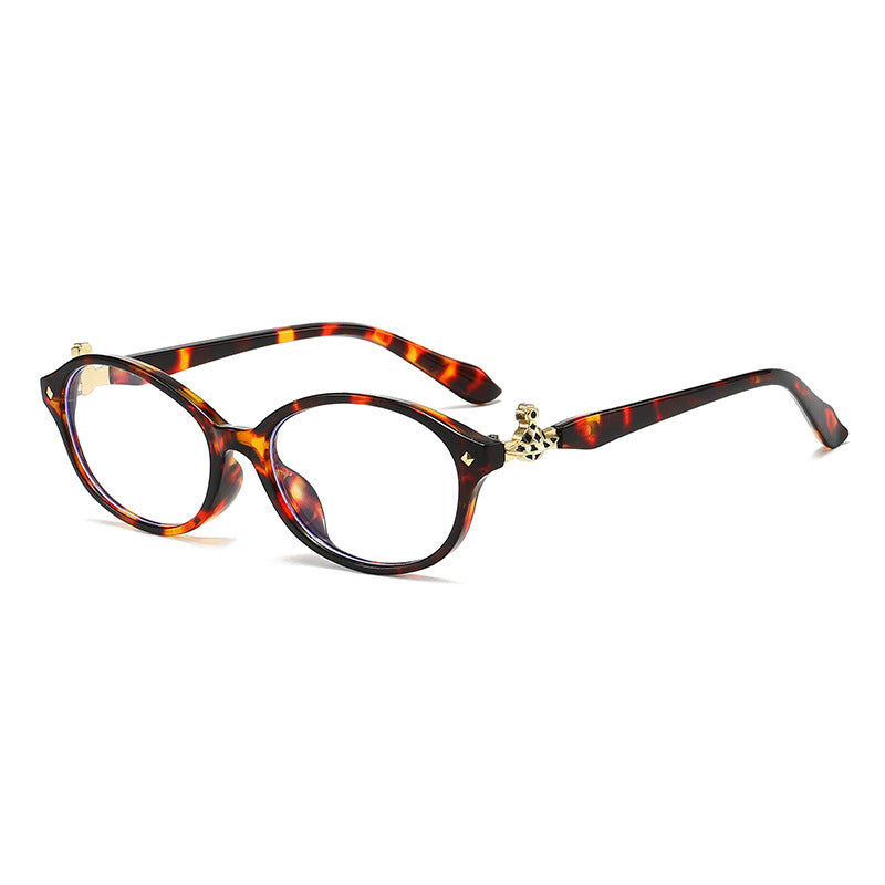 Dame motekunstig brille i elegant ova-design med gyldne aksenter Skanto