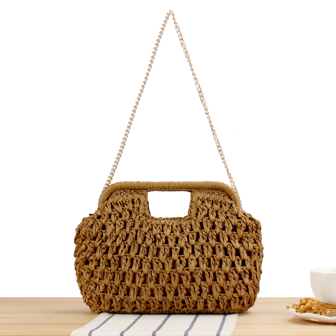 Beach shoulder bag made of natural weave with elegant chain decoration Skanto