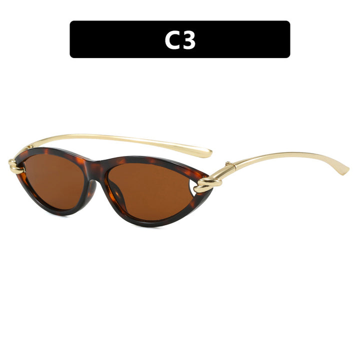 Damen Cat-Eye solbriller med elegant metallramme og beskyttende UV-filter Skanto
