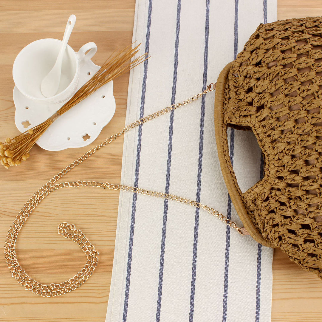 Beach shoulder bag made of natural weave with elegant chain decoration Skanto