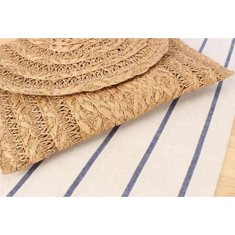 Shoulder bag made of high-quality braided natural material with an elegant wave pattern Skanto