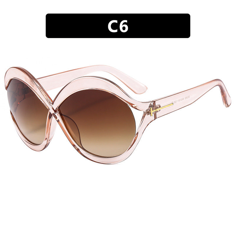 Dame ekstravagant formet solbrille Skanto