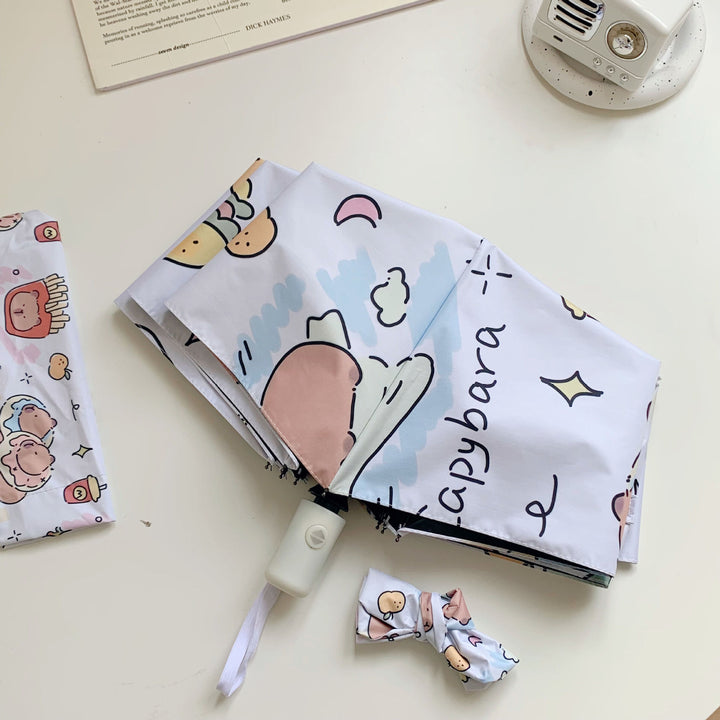 Damer sammenleggbar paraply med dyremotiver Skanto