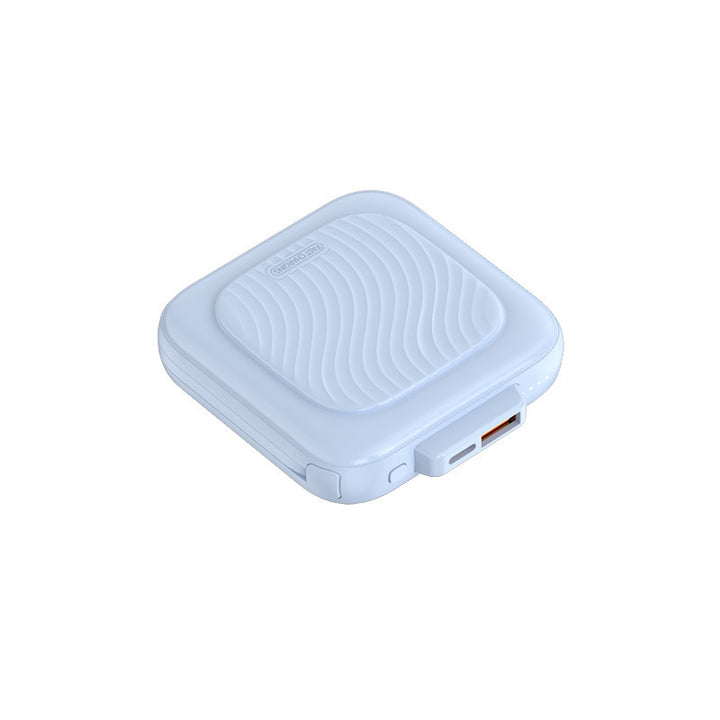 Kompakt lader med hurtigladefunksjon og ergonomisk design Skanto