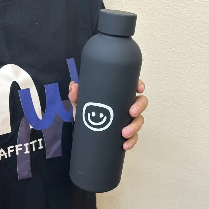 Dame-isoleringsflaske med kreativt Smiley-design Skanto