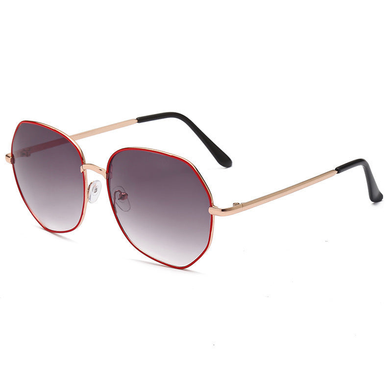 Damer moteriktig solbrille med åttekantet form og polarisert glass Skanto