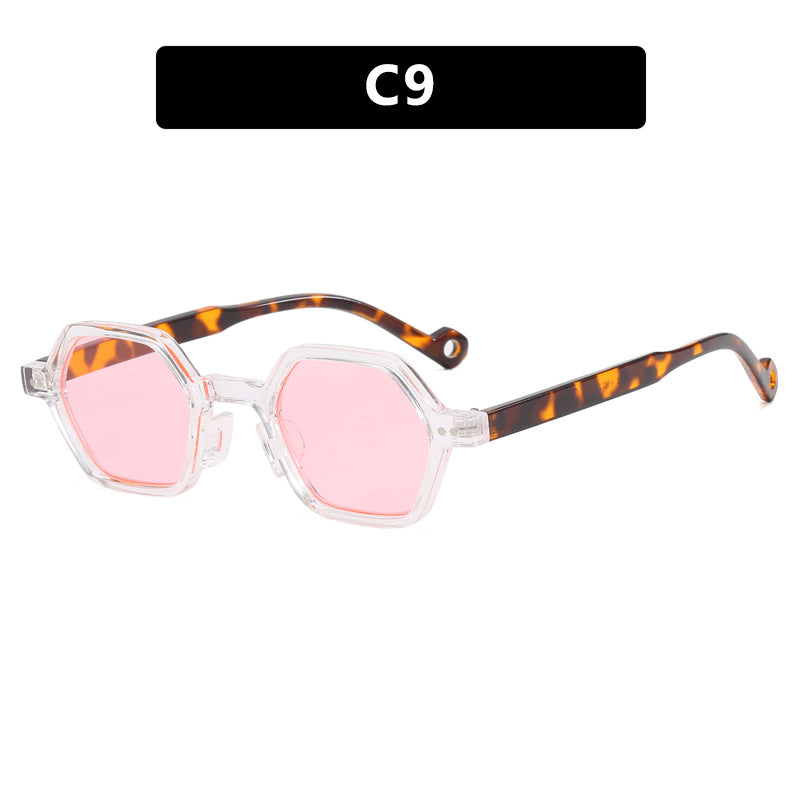 Dame heksagonal solbrille i moderne design med beskyttende linser Skanto