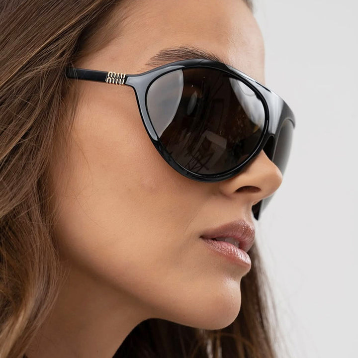 Damen Cat-Eye solbriller med unikt design og beskyttende UV-filter Skanto