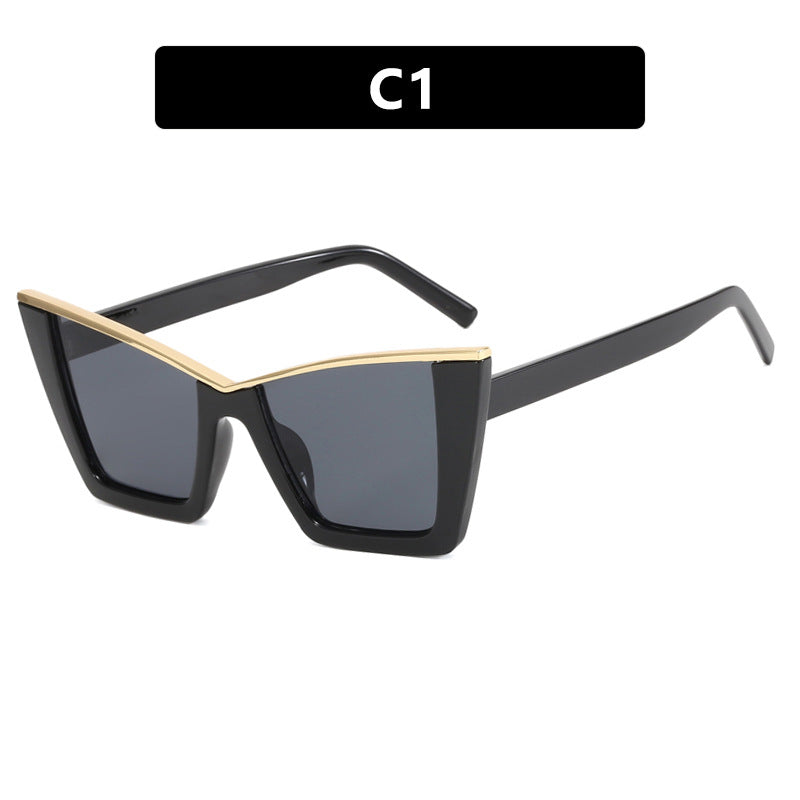 Dame moderne Cat-Eye solbriller med ekspressivt design og beskyttende UV-filter Skanto