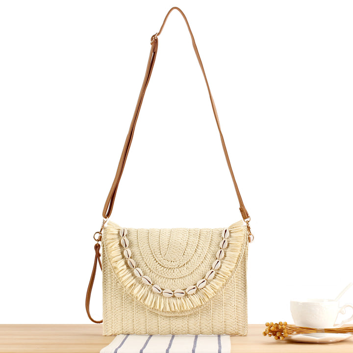 Shoulder bag with hand-knotted shell decor Skanto
