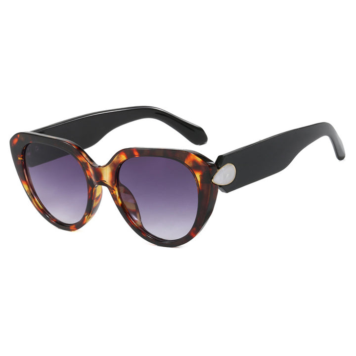Dame Cat-Eye solbriller med iøynefallende design og beskyttende UV-filter Skanto