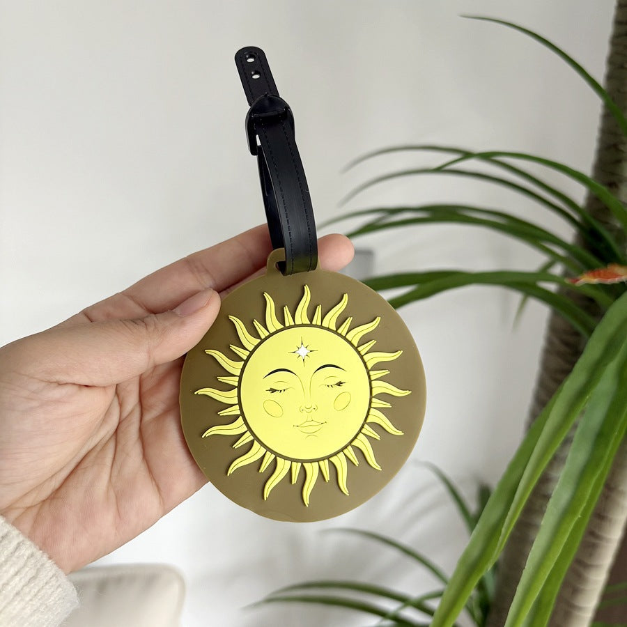 Lekenfull sol-tema bagasjelapp Skanto