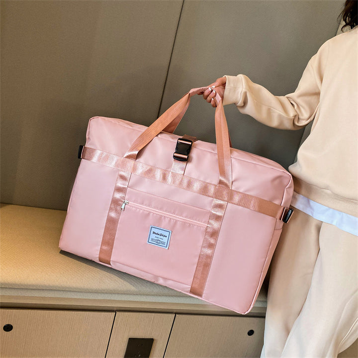 Stort sports-duffelbag med slitesterkt yttermateriale og smart rominndeling Skanto