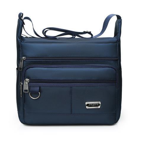 Praktisk crossbody-veske med multifunksjonelt fagssystem Skanto