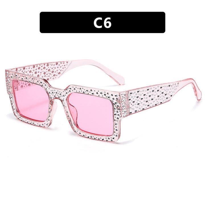 Dame ekstravagant solbrille med glitrende aksent Skanto