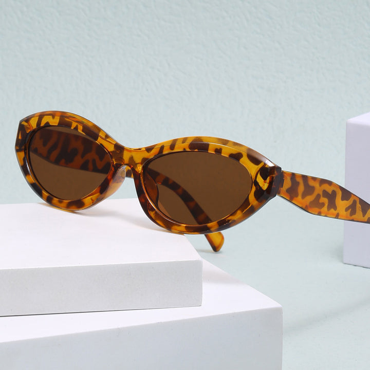 Dame cat-eye solbriller med bred ramme og UV-beskyttelse Skanto