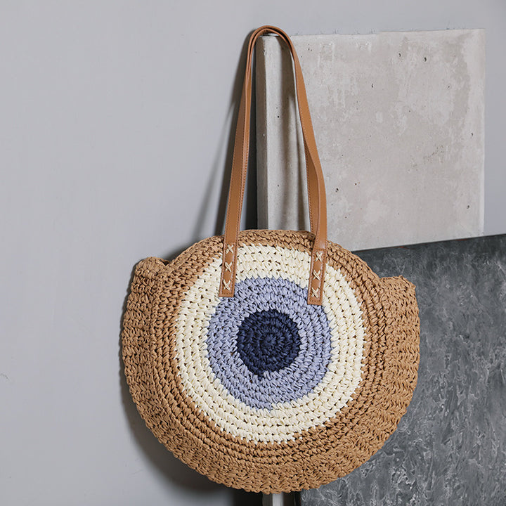 Rund kurvveske med moderne design Skanto