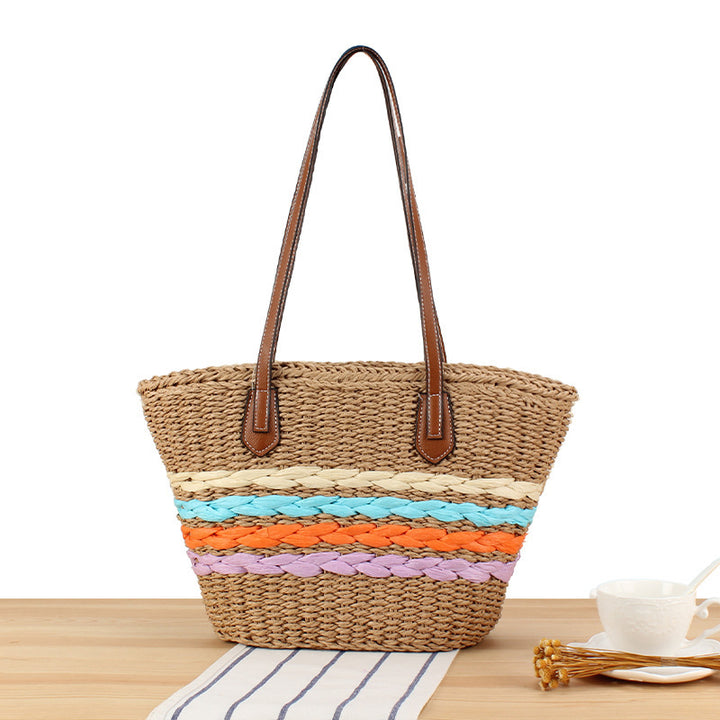 Leisure beach bag in woven natural material with colorful decoration Skanto