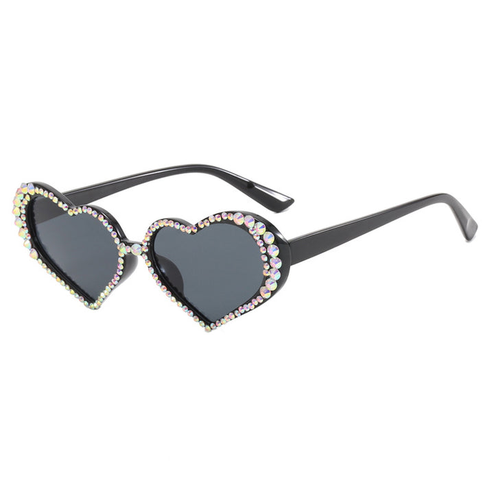 Dame hjerteformet solbrille med strassbesatt ramme Skanto