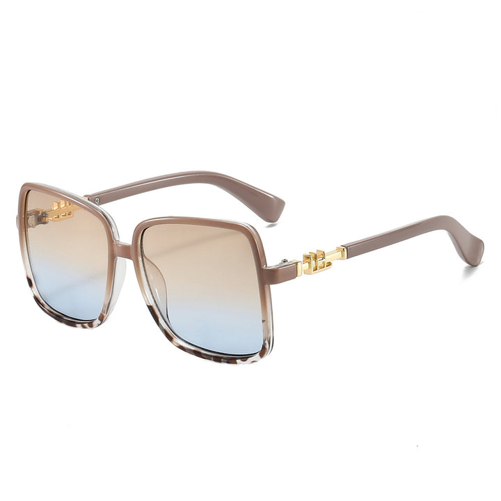 Dame solbrille med stor ramme og gradient Skanto