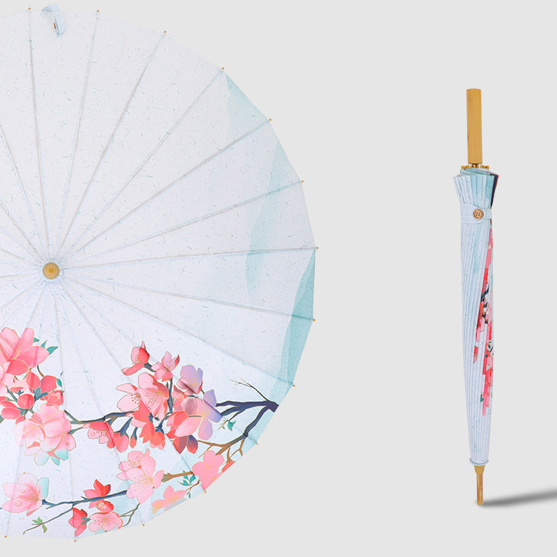 Kvinnens sammenleggbare solskjermparaply med kunstnerisk design Skanto
