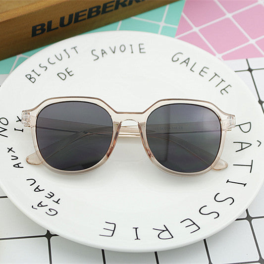 Dame moterik solbrille i elegant, åttekantet design Skanto