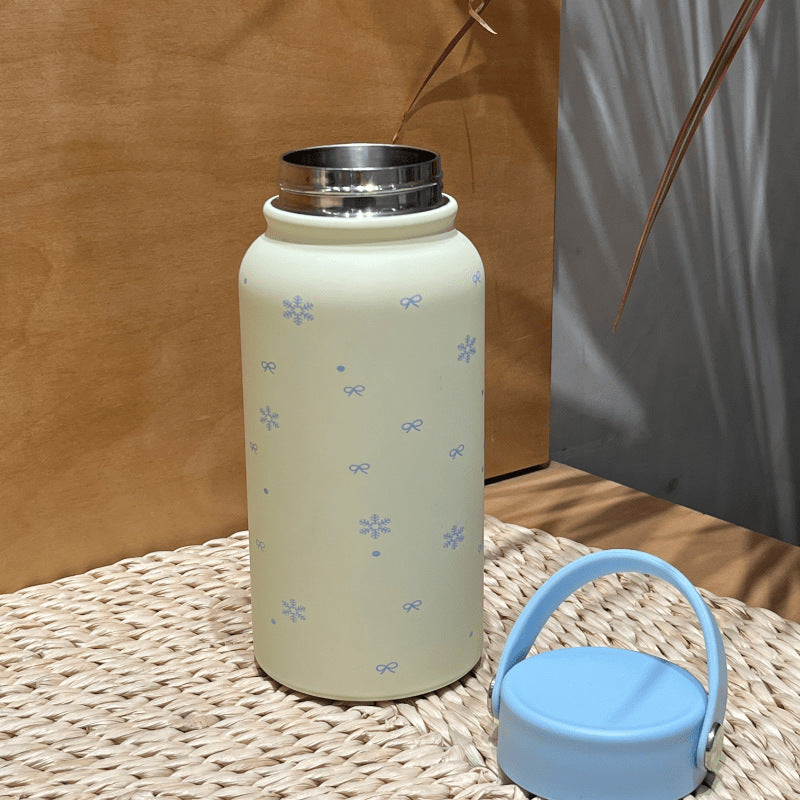 Damen Isoliertrinkflasche mit praktischem Tragegriff und fröhlichem Design Skanto