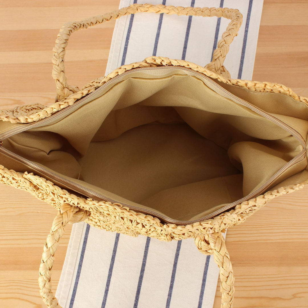 Hand-knotted beach bag with decorative motif Skanto