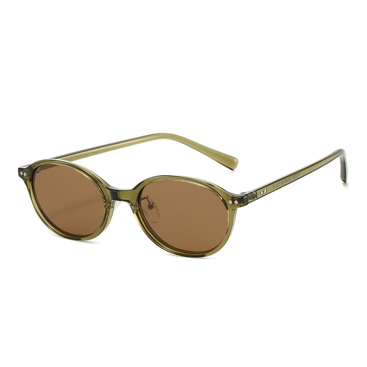 Dame Premium solbrille i elegant oval design Skanto