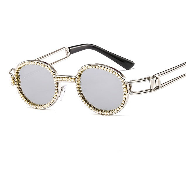 Dame feminin Designer-solbrille med ekstravagant ramme Skanto