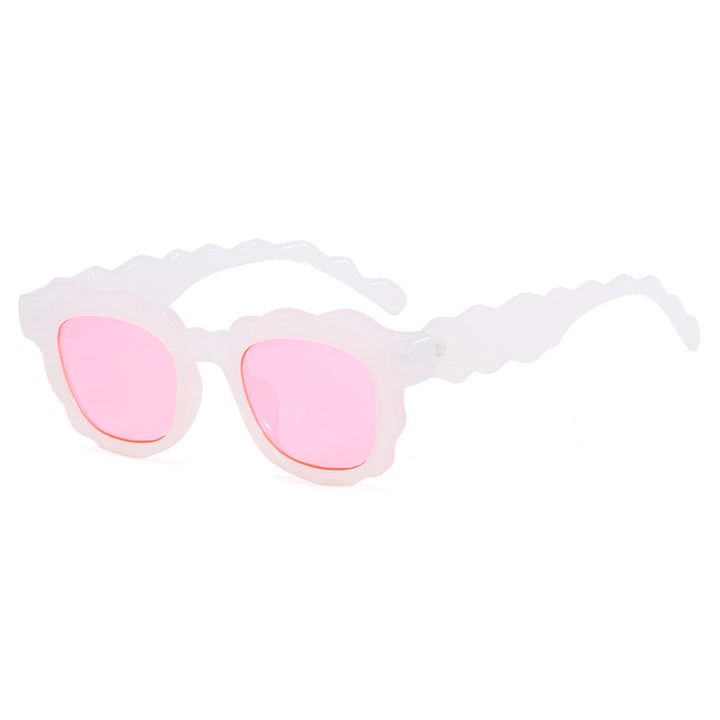 Dame moteriktig solbrille med bølgeramme Skanto