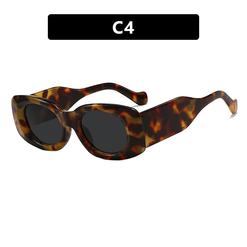 Dame futuristisk solbrille i elegant kvadratdesign Skanto