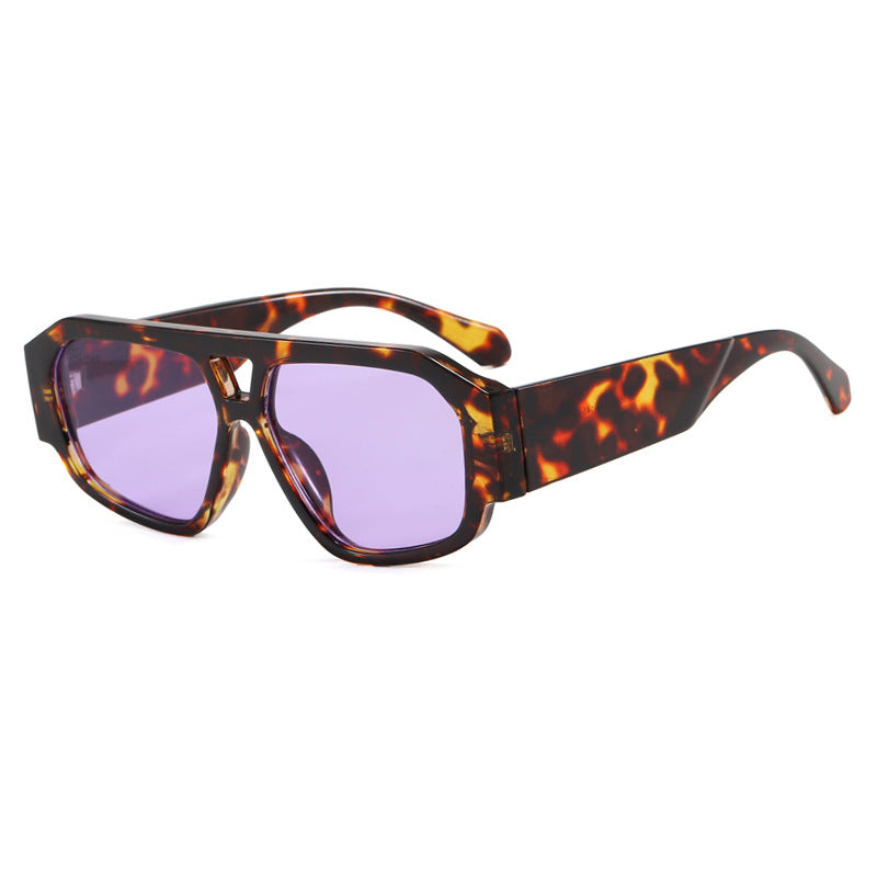 Dame solbrille med iøynefallende oktagon-design og UV-beskyttelse Skanto