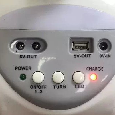 Kvinnelig bærbar solfanger med integrert LED-lampe og fjernkontroll Skanto