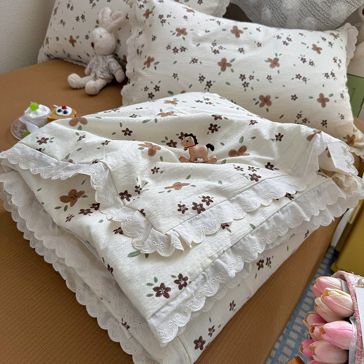 Dame Koselig Dagsdeke med lekent blomsterdesign Skanto