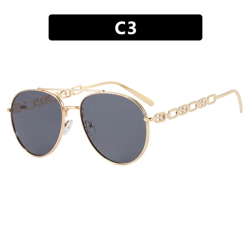 Dame iøynefallende solbriller med luksuriøs kjededetalj og polarisert glass Skanto