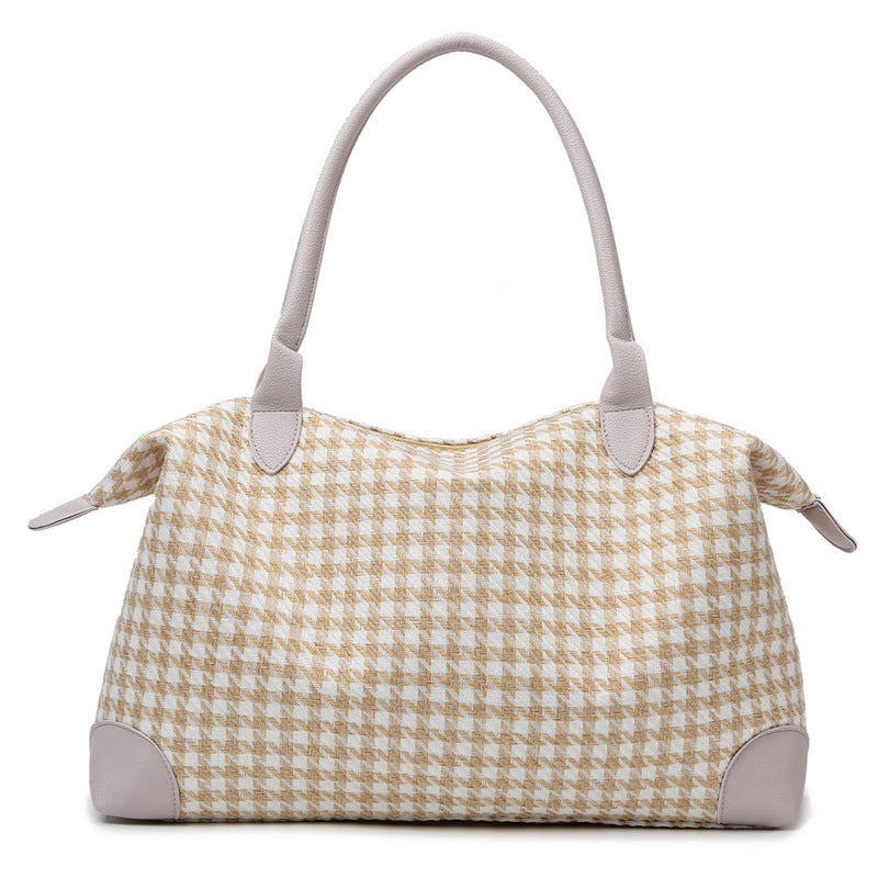 Moderne håndveske i tidløs houndstooth-mønster Skanto