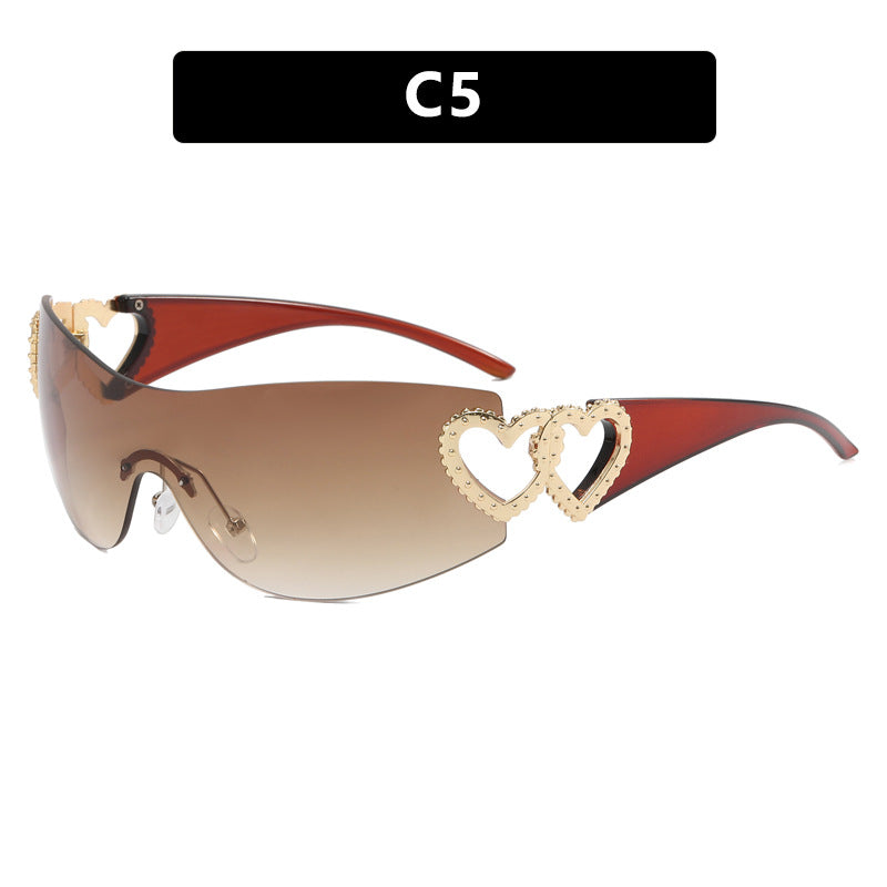 Dame Fashion-solbrille med hjerte-applikasjoner Skanto