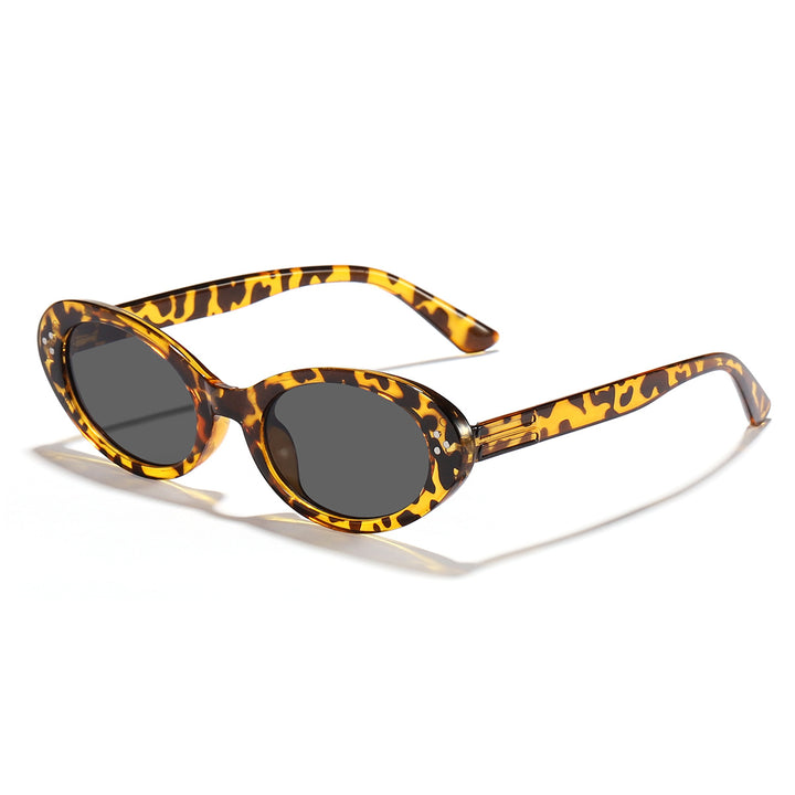 Dame moter solbrille med elegant, oval design Skanto
