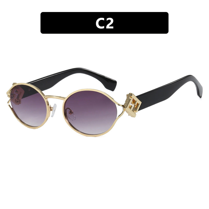 Dame moter solbrille med elegant metallramme og UV-beskyttelse Skanto