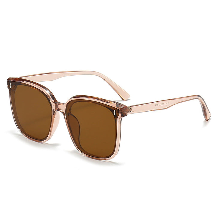 Dame Motekom solbrille med beskyttende UV-filter og elegant design Skanto