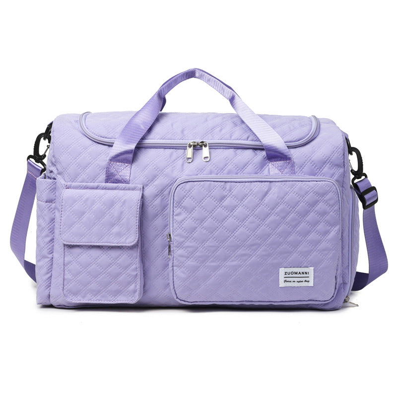 Romslig sports-duffelbag med strukturert overflate Skanto