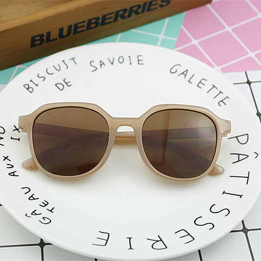 Dame moterik solbrille i elegant, åttekantet design Skanto